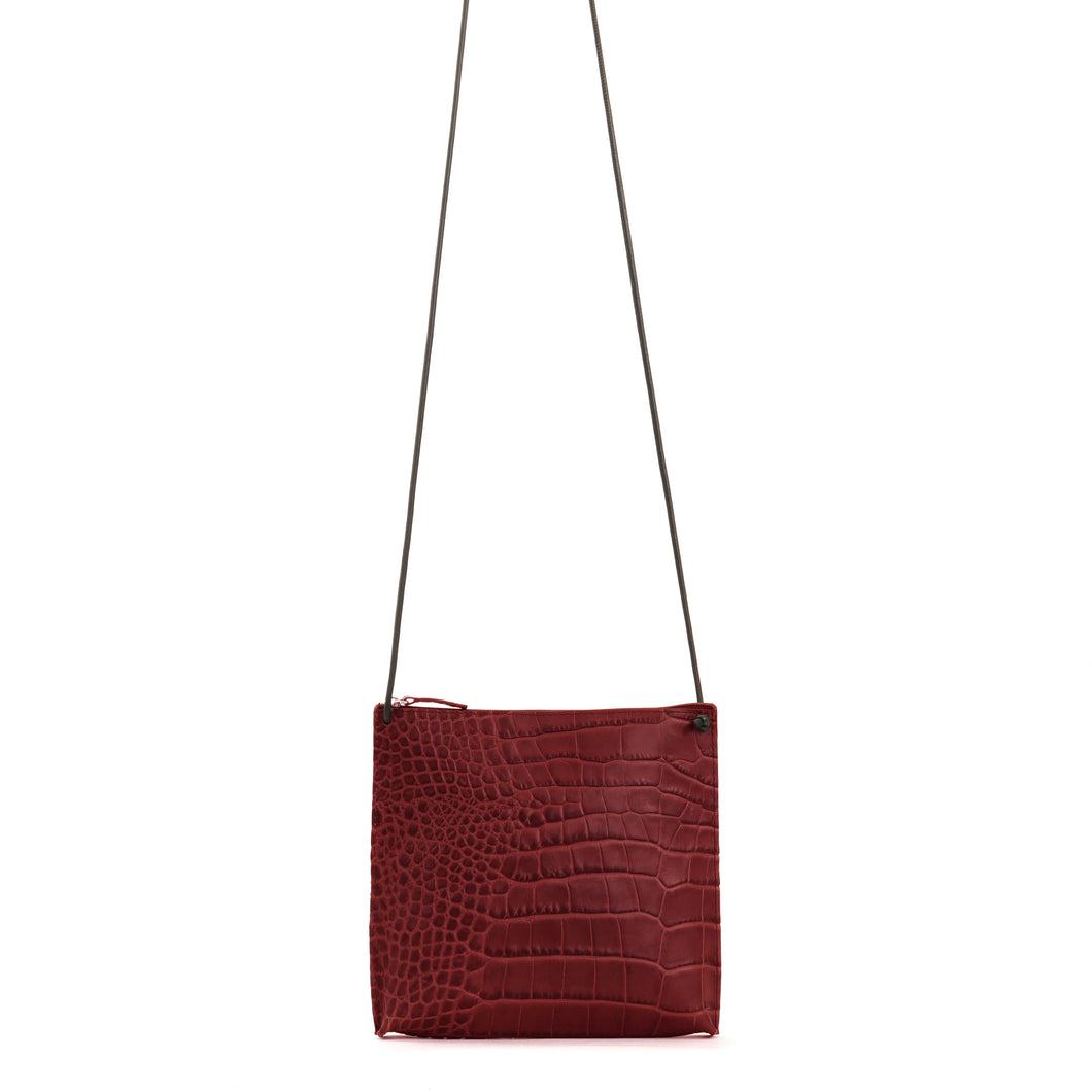 B. May Crossbody Pouch (Embossed Oxblood)